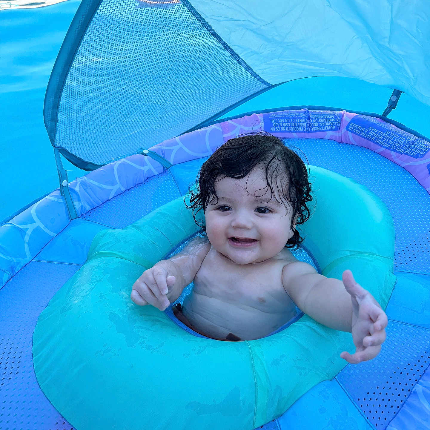 Oziah joined the competition — help win amazing prizes! baby, bodypart, face, finger, hand, head, inflatable, leisureactivities, nature, outdoors, person, photography, pool, portrait, sport, summer, swimming, swimmingpool, water, watersports