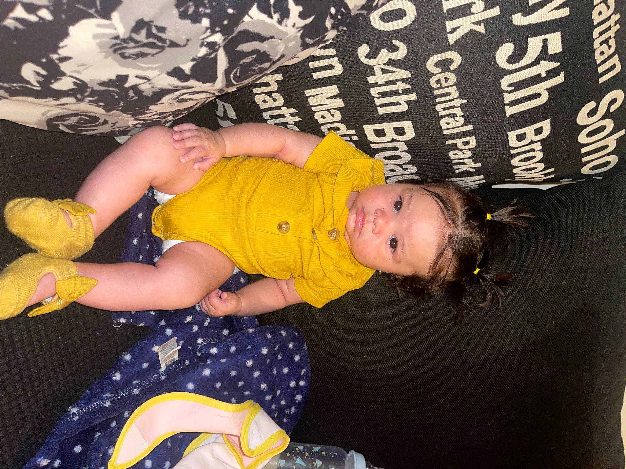 Ariya is registered to the contest to win money with this photo: baby, baby_products, baby_toddler_clothing, beauty, child, comfort, fun, happy, human_leg, lap, mammal, pattern, person, product, room, sitting, t_shirt, thigh, toddler, vertebrate