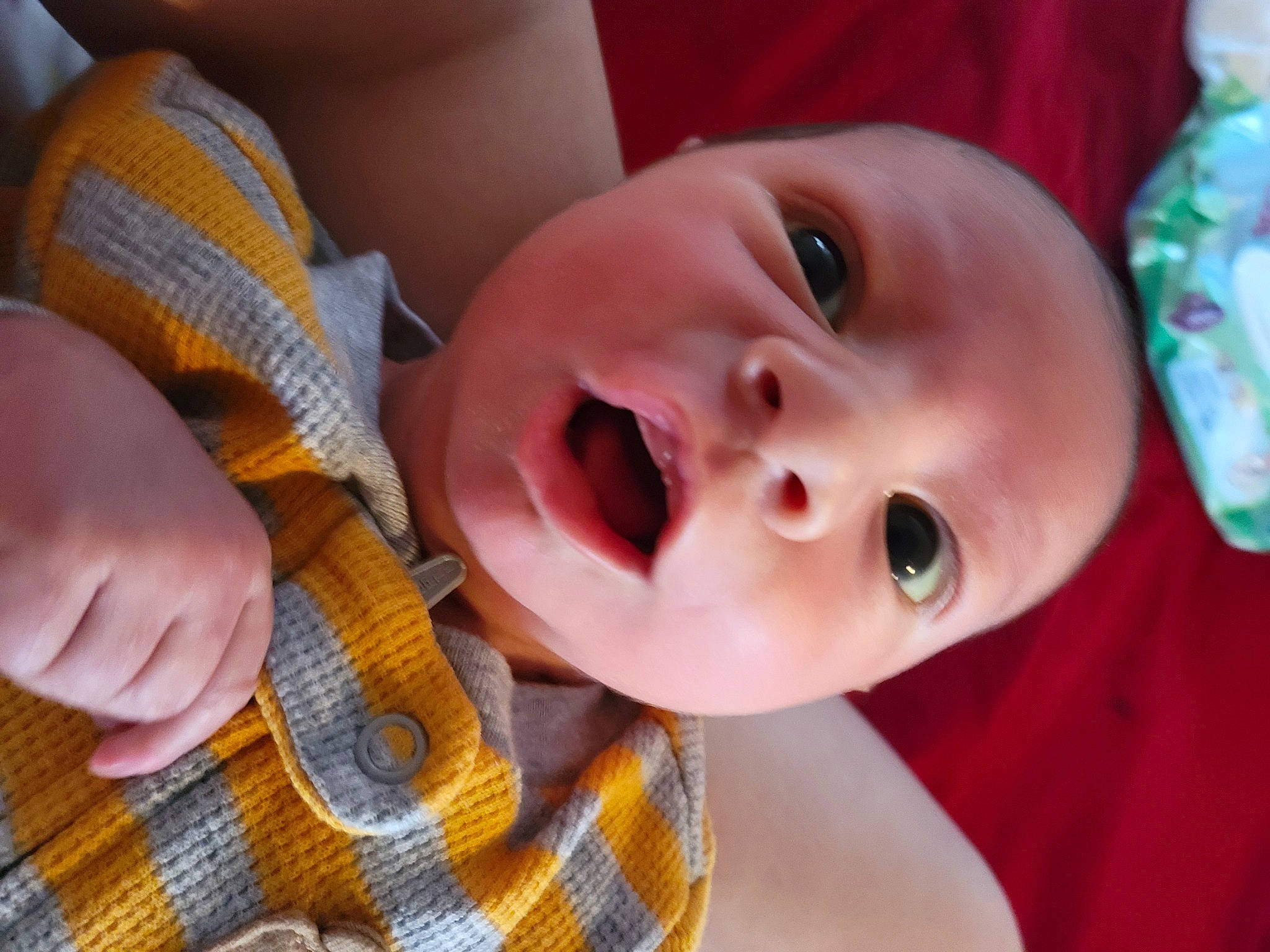 Johnathan is registered to the contest to win money with this photo: baby, baby_toddler_clothing, cheek, child, chin, eyebrow, facial_expression, finger, happy, iris, leaf, lip, mammal, mouth, nose, person, product, skin, smile, toddler