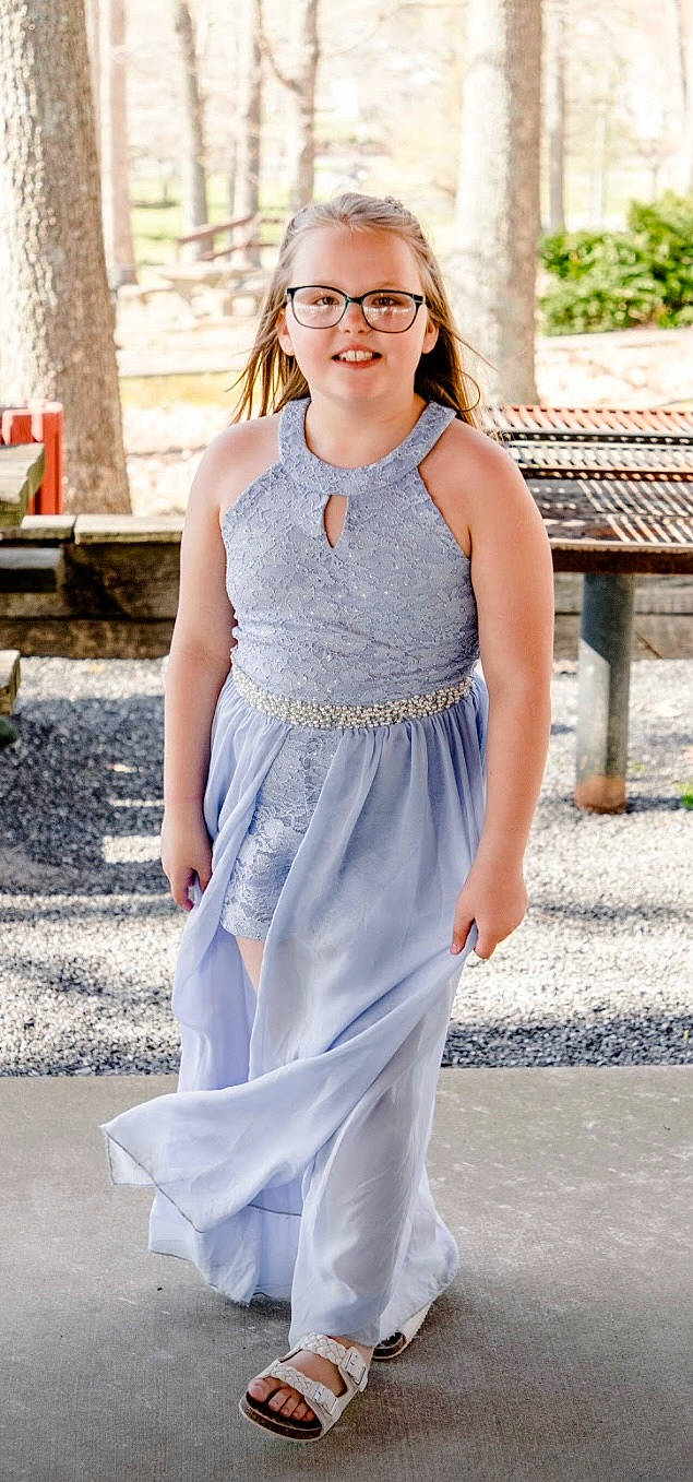 Maggie joined the competition — help win amazing prizes! arm, bridal_accessory, bridal_party_dress, day_dress, dress, electric_blue, event, fashion_design, fashion_model, formal_wear, gown, happy, joy, long_hair, one_piece_garment, pattern, peach, person, sleeve, smile