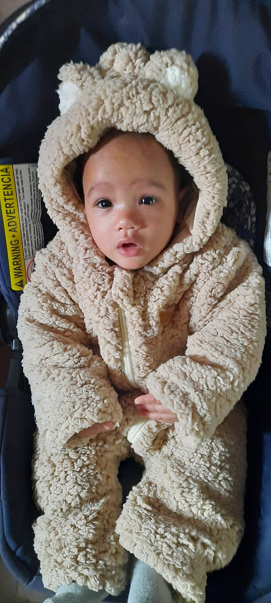 Jedidiah is registered to the contest to win money with this photo: baby, baby_toddler_clothing, cap, cheek, child, collar, comfort, eye, face, fur, head, headgear, knit_cap, linens, lip, person, skin, sleeve, toddler, wool