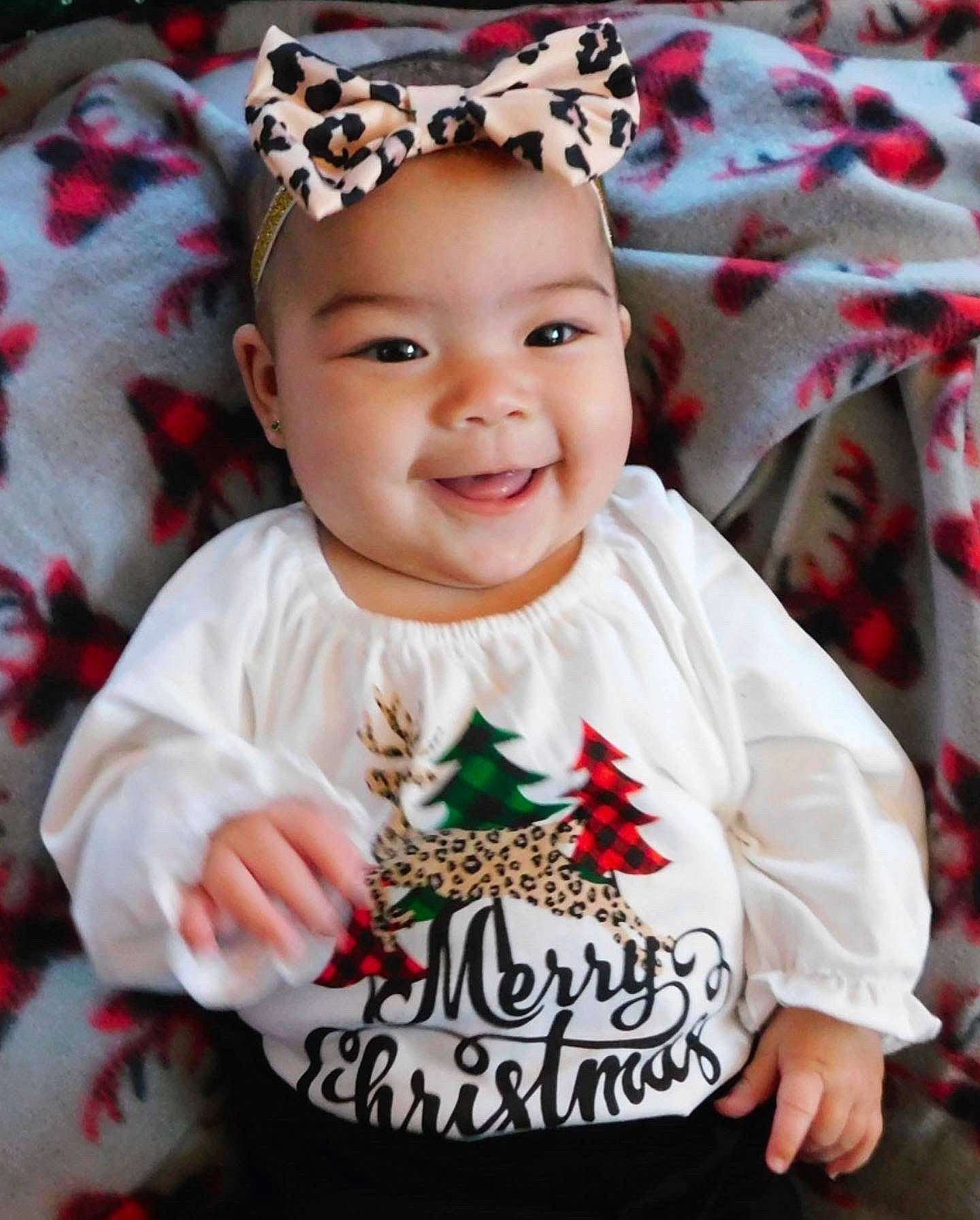 Klara joined the competition — help win amazing prizes! baby, baby_toddler_clothing, cheek, child, event, face, facial_expression, happy, head, headband, headpiece, headwear, joy, magenta, outerwear, pattern, person, pink, sleeve, smile