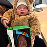 baby, child, sleeping, hoodie, brown, fur, hand, box, chocolate, egg, ribbon, table, phone, indoor, person, food, gift, cute, soft, warm