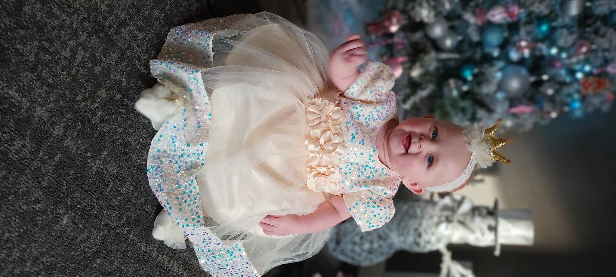 Jessica joined the competition — help win amazing prizes! baby, baby_toddler_clothing, child, christmas_decoration, christmas_ornament, christmas_tree, dress, event, fashion_accessory, fun, happy, holiday, joy, ornament, pattern, person, pink, plant, smile, toddler