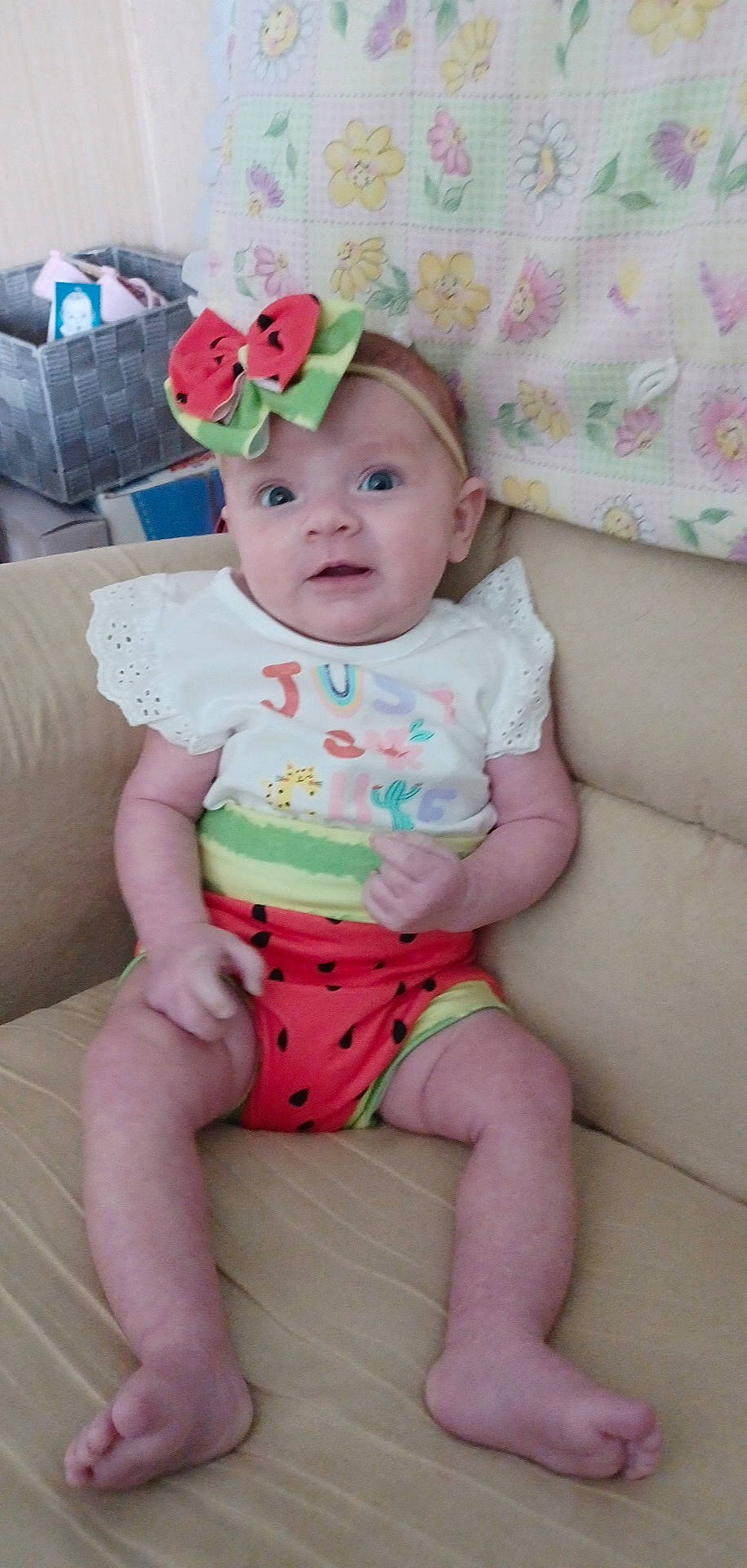 Rhea joined the competition — help win amazing prizes! baby, baby_toddler_clothing, cap, cheek, chin, comfort, eye, face, facial_expression, happy, head, headwear, human_leg, iris, knee, person, pink, skin, sleeve, stomach