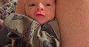 Kassian joined the competition — help win amazing prizes! baby, child, comfort, cozy, curious, cute, expression, face, holding, home, indoor, infant, legs, newborn, pajamas, person, portrait, skin, sleepwear, young