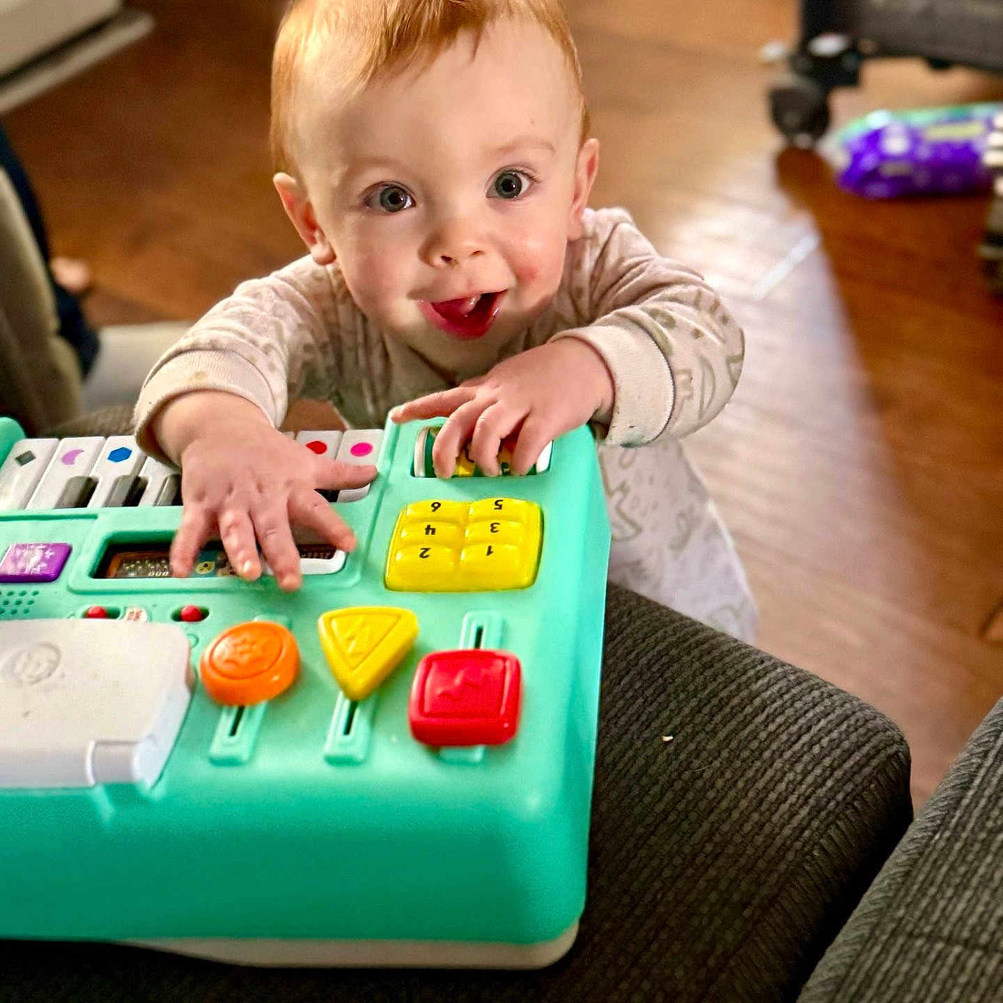 Kallen joined the competition — help win amazing prizes! baby, bodypart, clothing, couch, face, finger, furniture, hand, head, legoset, number, person, photography, play, portrait, sitting, sleeve, symbol, text, toy