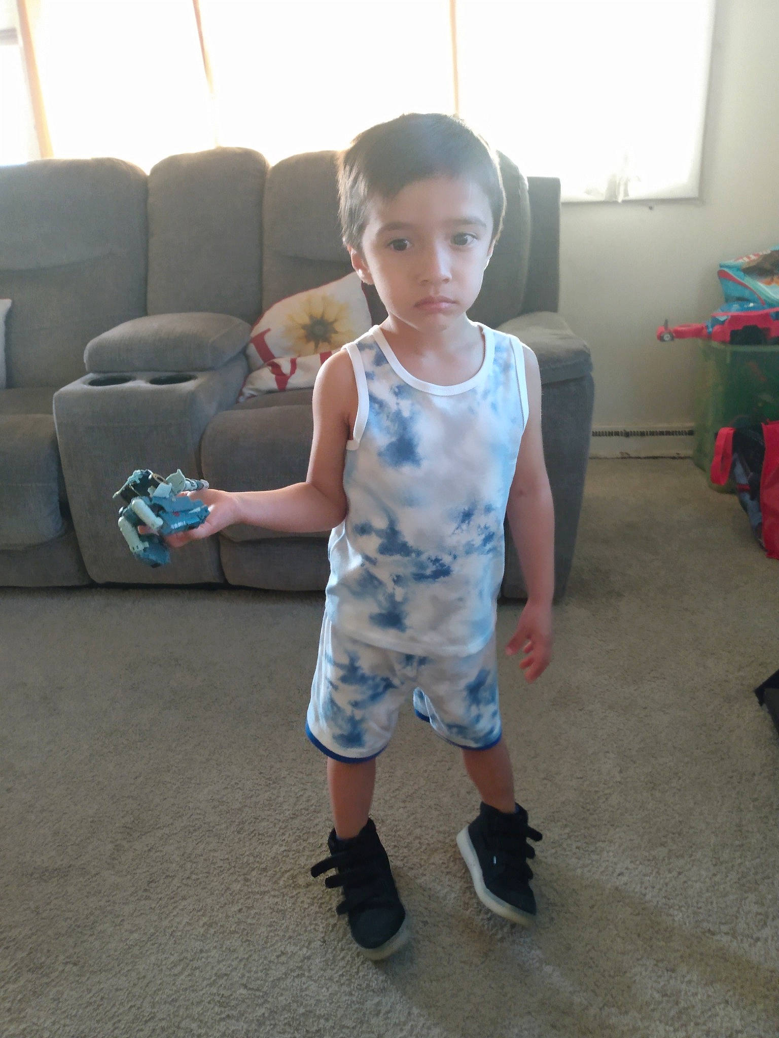 Connor joined the competition — help win amazing prizes! child, comfort, elbow, floor, flooring, fun, happy, head, human_leg, knee, leg, leisure, mammal, person, shorts, sitting, t_shirt, thigh, thumb, toddler