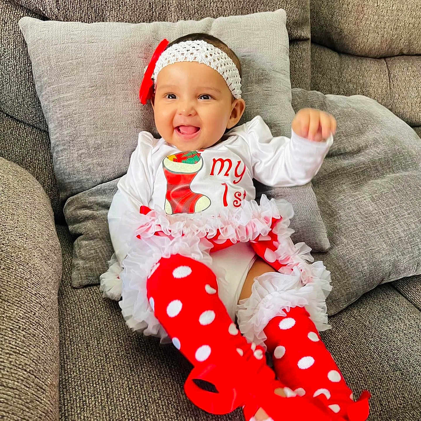 Dixita joined the competition — help win amazing prizes! baby, babylaughing, blanket, clothing, couch, cushion, face, festival, furniture, happy, head, homedecor, hosiery, pajamas, person, photography, portrait, sitting, smile, sock