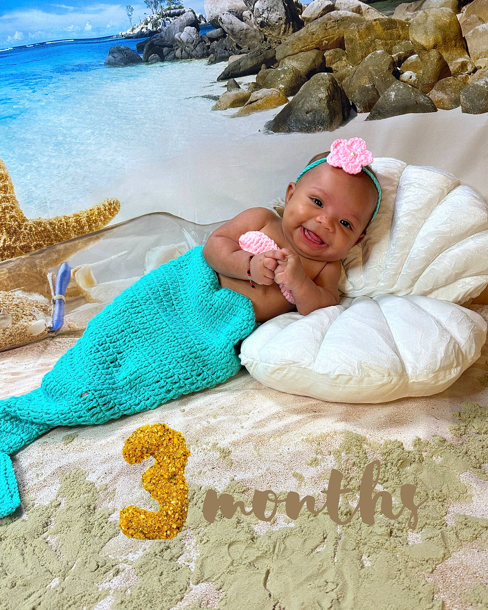 Dehlani is registered to the contest to win money with this photo: baby, baby_toddler_clothing, beach, child, coast, comfort, fun, happy, joy, leisure, linens, ocean, pattern, people_in_nature, person, sand, sitting, smile, textile, toddler