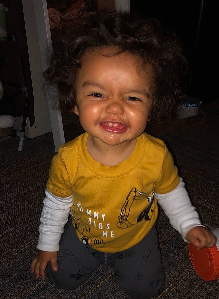 Mason is registered to the contest to win money with this photo: baby, baby_toddler_clothing, black, cheek, chin, cool, eye, floor, flooring, happy, human_body, iris, lip, mouth, neck, nose, person, shoulder, skin, sleeve
