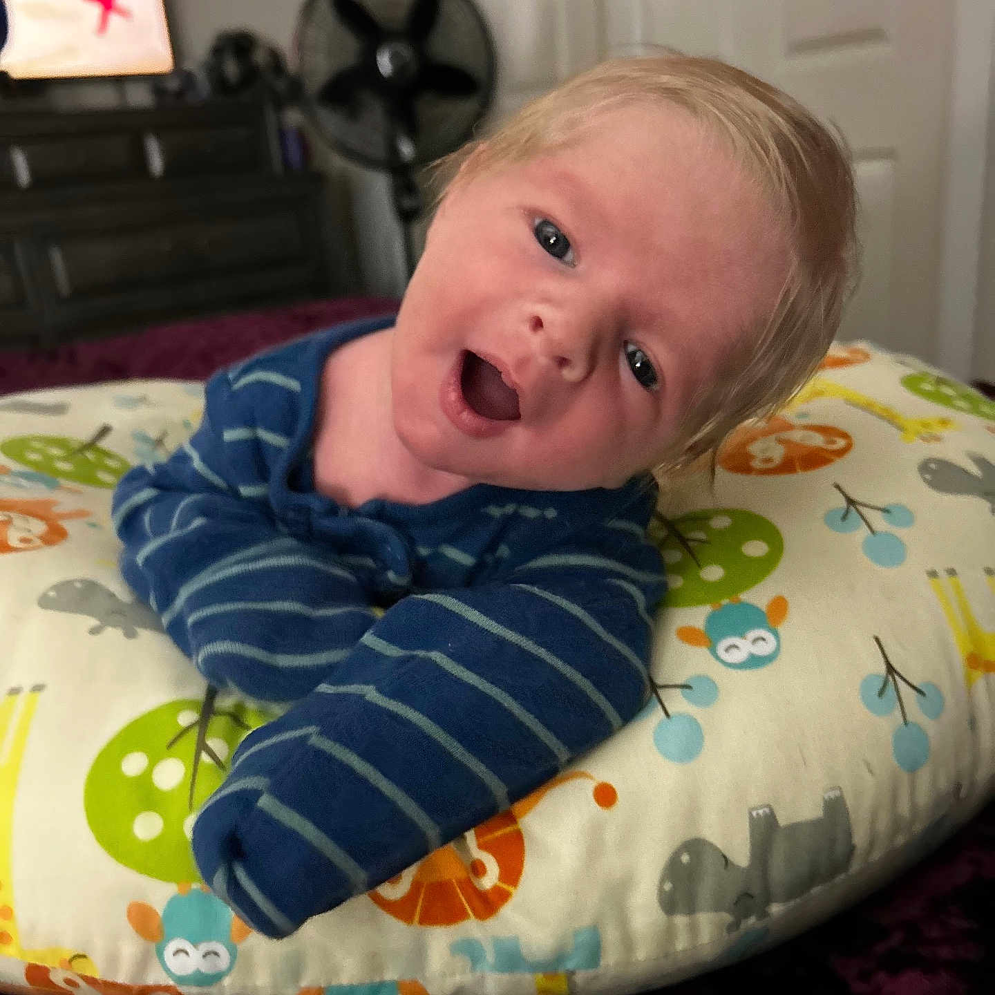 Mason is registered to the contest to win money with this photo: baby, bed, bedroom, bodypart, couch, crying, cushion, face, finger, furniture, hand, head, homedecor, indoors, person, photography, pillow, portrait, quilt, room