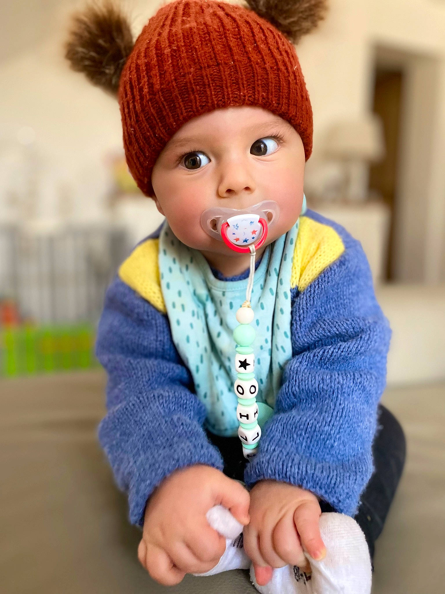 Lilio participe au concours pour gagner de l'argent avec cette photo : baby_toddler_clothing, cap, child, chin, clothing, electric_blue, eye, face, hairstyle, happy, head, headgear, headwear, human_body, knit_cap, outerwear, person, sleeve, textile, toddler