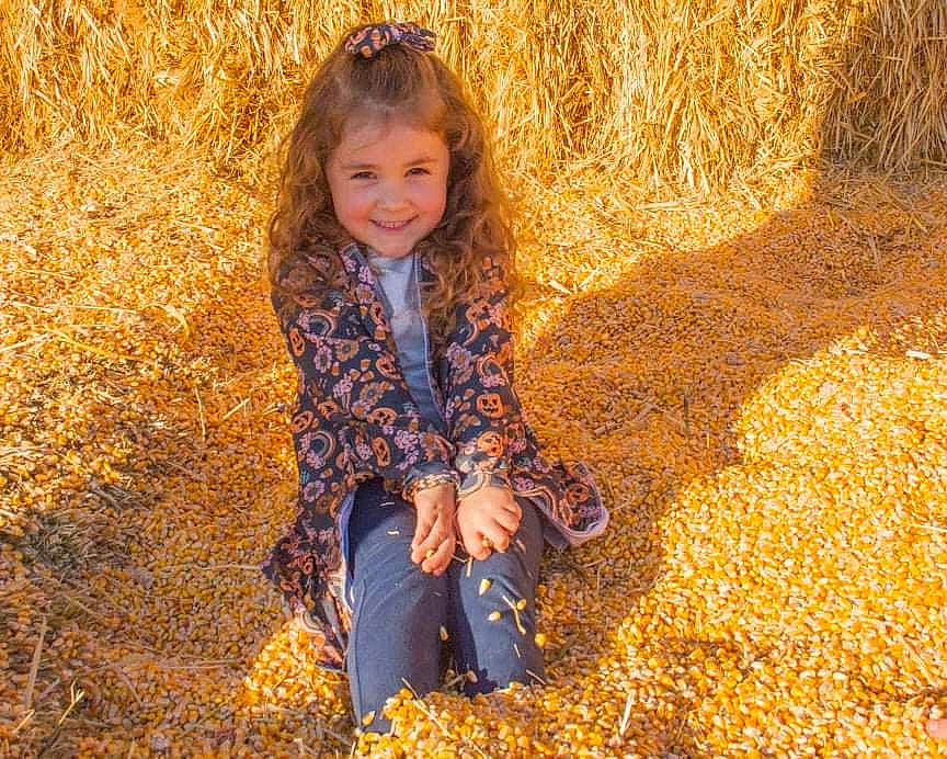 Harmony is registered to the contest to win money with this photo: adaptation, deciduous, electric_blue, fawn, fun, grass, hair, hairstyle, happy, joy, leisure, long_hair, nature, people_in_nature, person, plant, smile, soil, sunlight, tints_and_shades