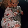 child, children, pajamas, kiss, hug, indoor, chair, cute, smile, face, baby, sibling, cozy, foot, person, love, affection, family, home, portrait