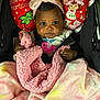Kyomi joined the competition — help win amazing prizes! baby, infant, pink_blanket, headband, bow, car_seat, pacifier, strawberry_shortcake, pillow, cute, child, portrait, indoors, cozy, clothing, face, person, seatbelt, blanket, toy