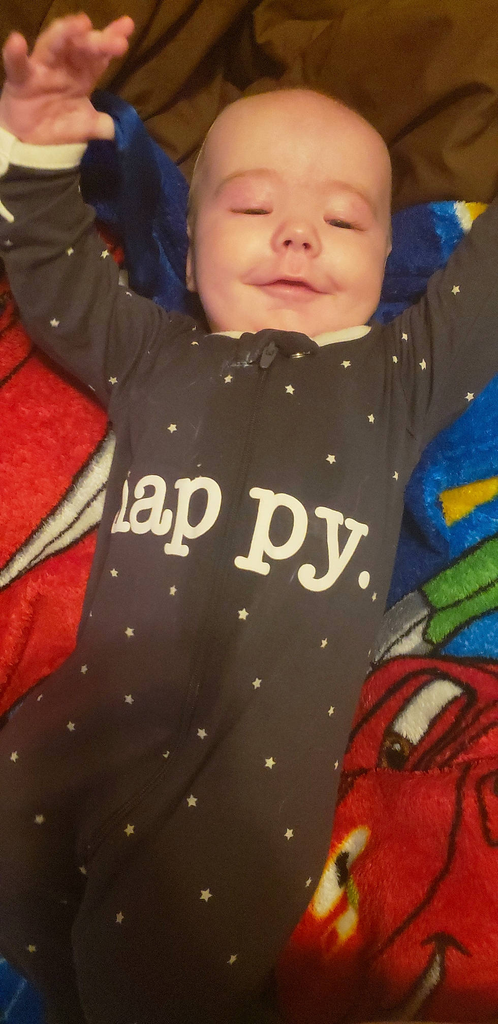 Logan joined the competition — help win amazing prizes! baby, baby_toddler_clothing, cheek, child, cool, face, facial_expression, finger, fun, gesture, happy, mouth, organ, outerwear, pattern, person, sleeve, smile, t_shirt, textile