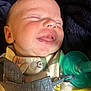 Bradley is registered to the contest to win money with this photo: baby, infant, face, close_up, pacifier, clothing, sleeping, smiling, mouth, skin, head, newborn, cute, child, young, expression, indoors, blanket, soft, peaceful