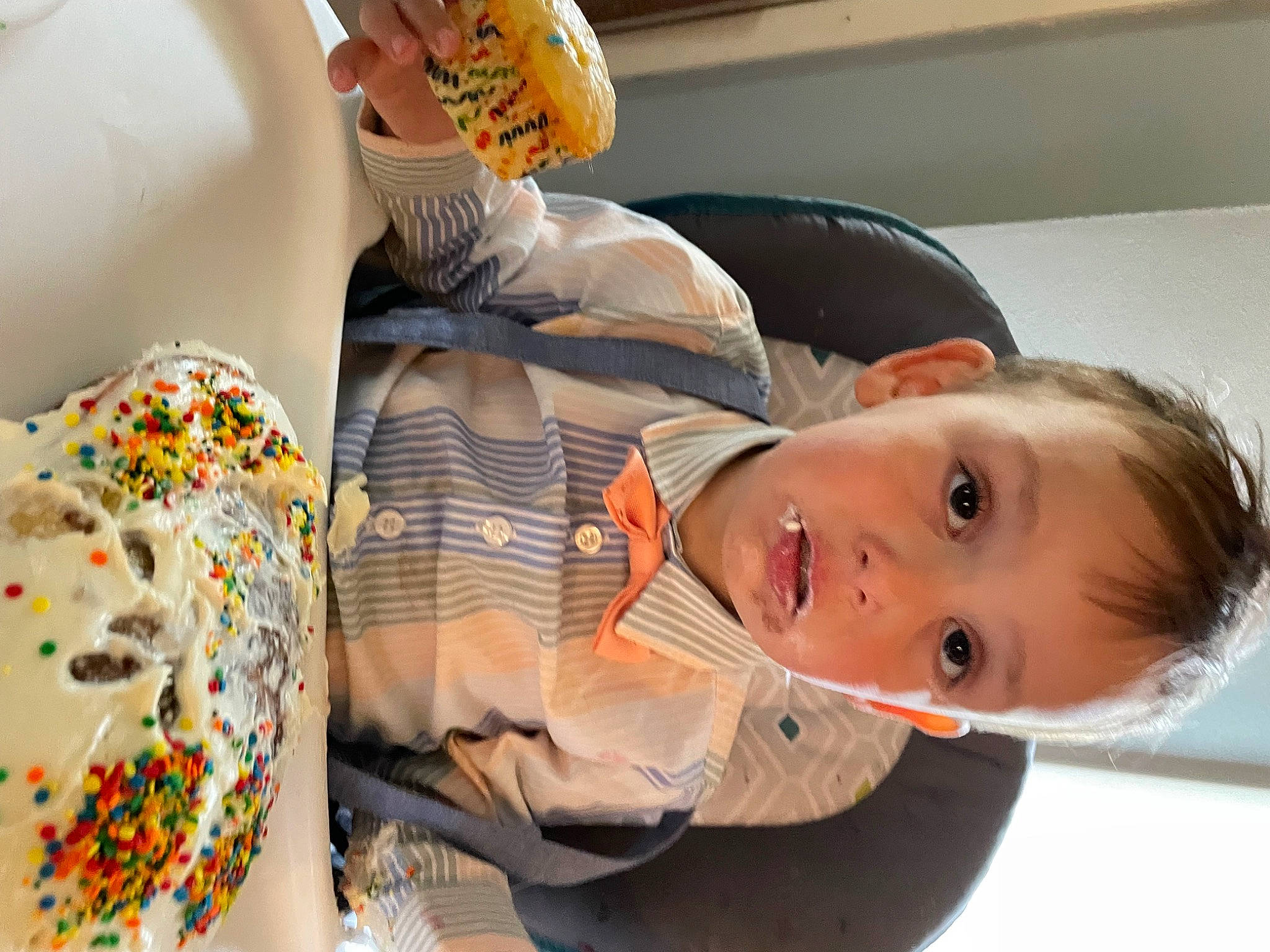 Adonis is registered to the contest to win money with this photo: baby, baby_products, baby_toddler_clothing, child, comfort, comfort_food, dress_shirt, food, linens, orange, pattern, person, room, sleeve, toddler