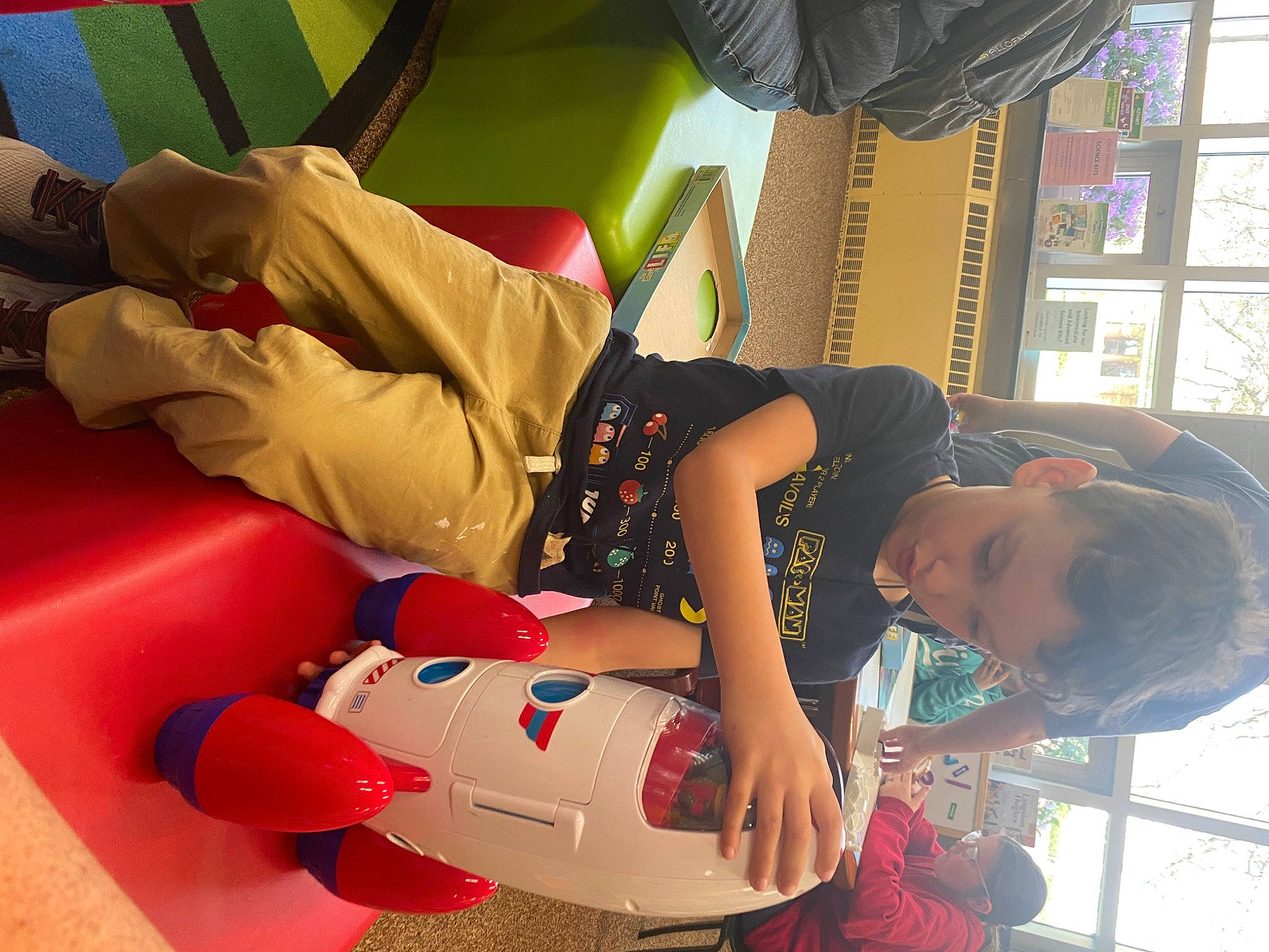 Mateo joined the competition — help win amazing prizes! baby_products, carmine, child, comfort, curtain, fun, happy, human_leg, knee, lap, leisure, person, play, recreation, room, sitting, thigh, toddler, toy, window