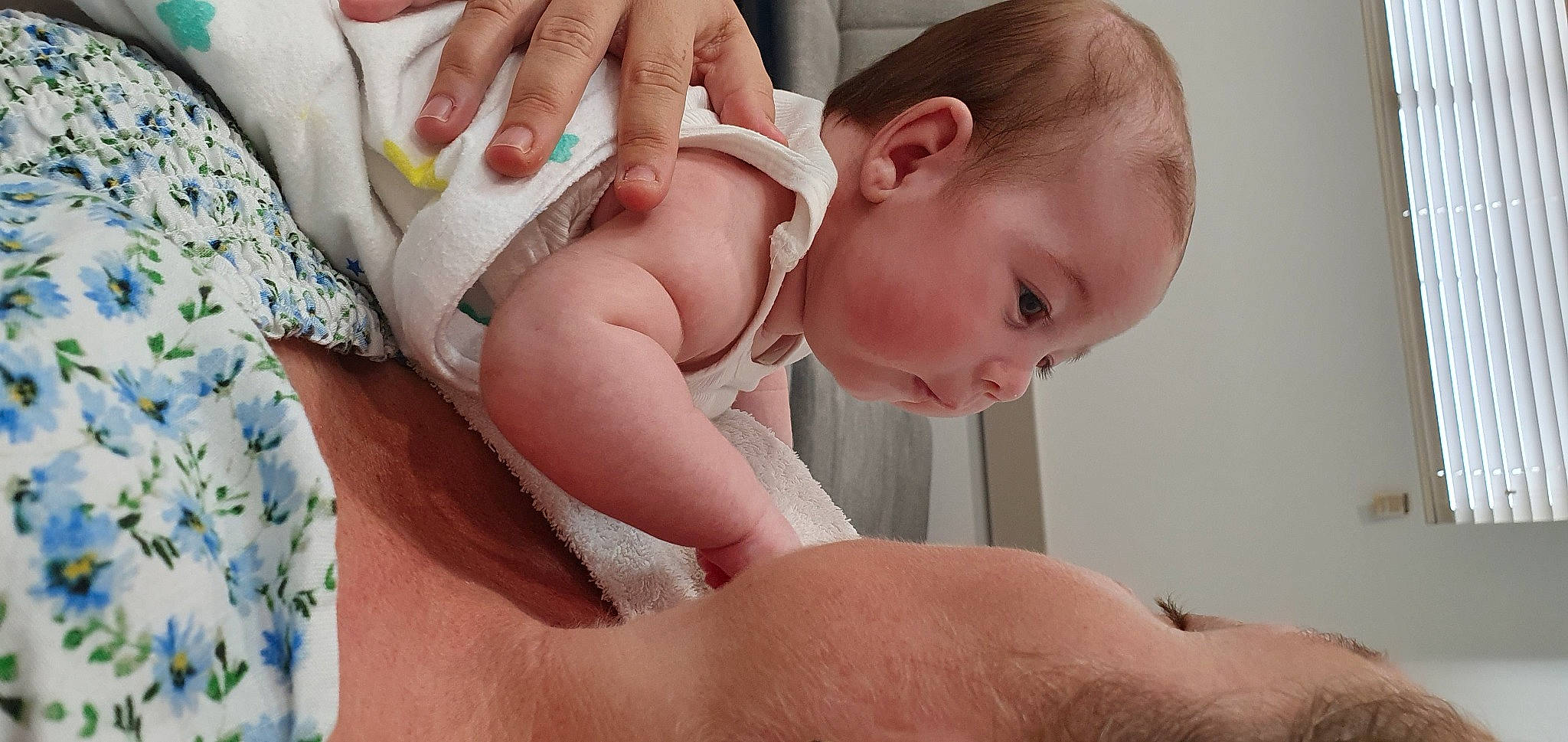 Freyja is registered to the contest to win money with this photo: arm, baby, cheek, chest, comfort, eyelash, finger, gesture, hand, head, human_body, joint, mouth, neck, nose, organ, person, skin, stomach, thumb