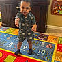 Mayson joined the competition — help win amazing prizes! carpet, child, colorful_rug, educational_rug, face, fish_tank, happy, home, indoor, person, pineapple_decoration, playroom, shirt, shorts, smile, socks, standing, toddler, toy, wooden_toy