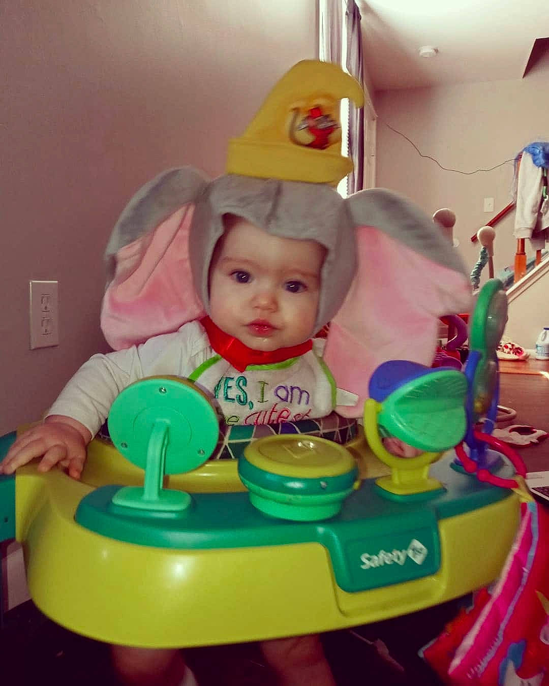 Gianna joined the competition — help win amazing prizes! baby, baby_products, baby_toys, child, costume_hat, event, figurine, fun, hat, headwear, party_hat, party_supply, person, pink, plastic, play, product, recreation, riding_toy, room