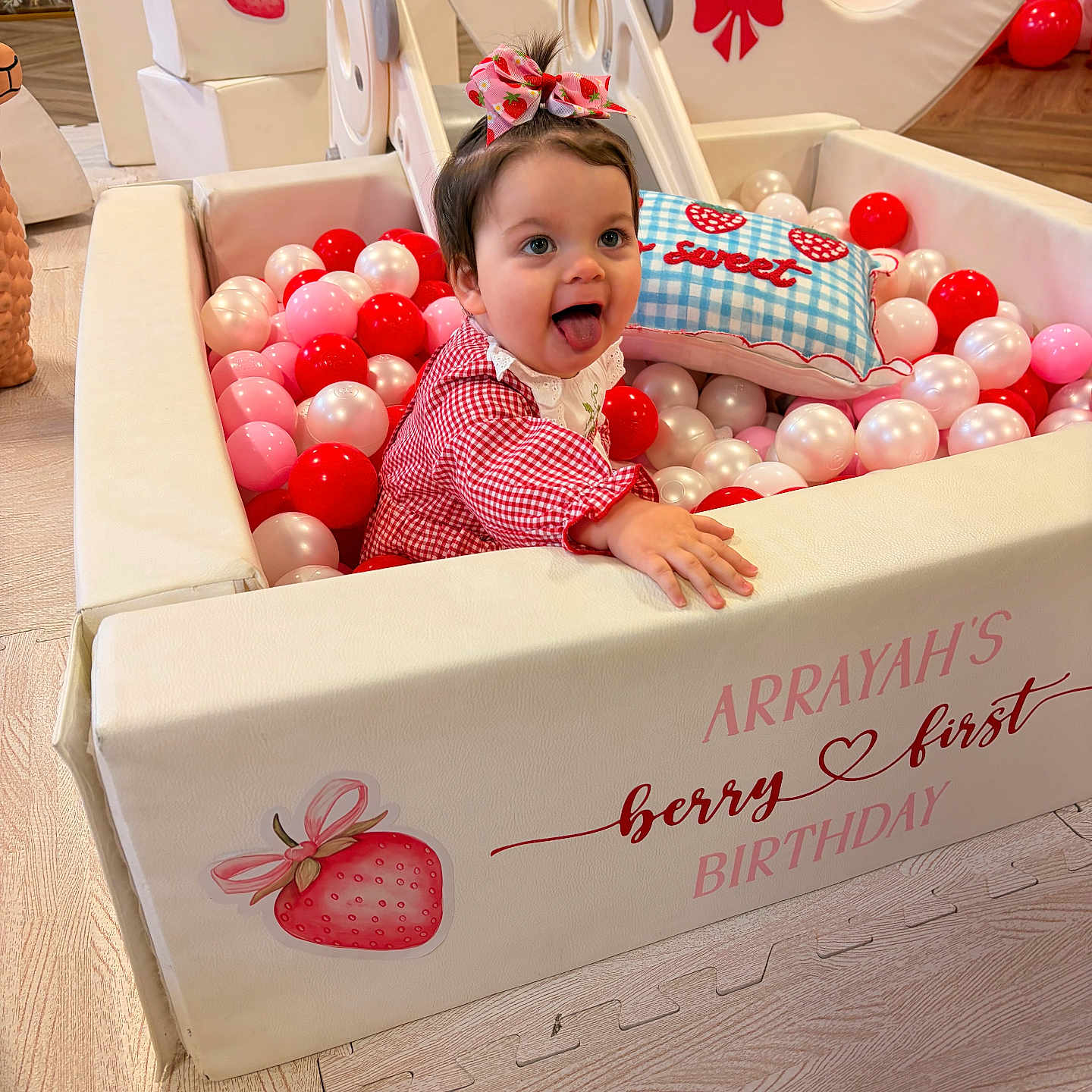 Arrayah joined the competition — help win amazing prizes! baby, ball_pit, balloons, birthday, bow, celebration, child, cute, decorations, dress, floor, indoor, party, pearls, pillow, pink, playful, red, strawberry, tongue_out
