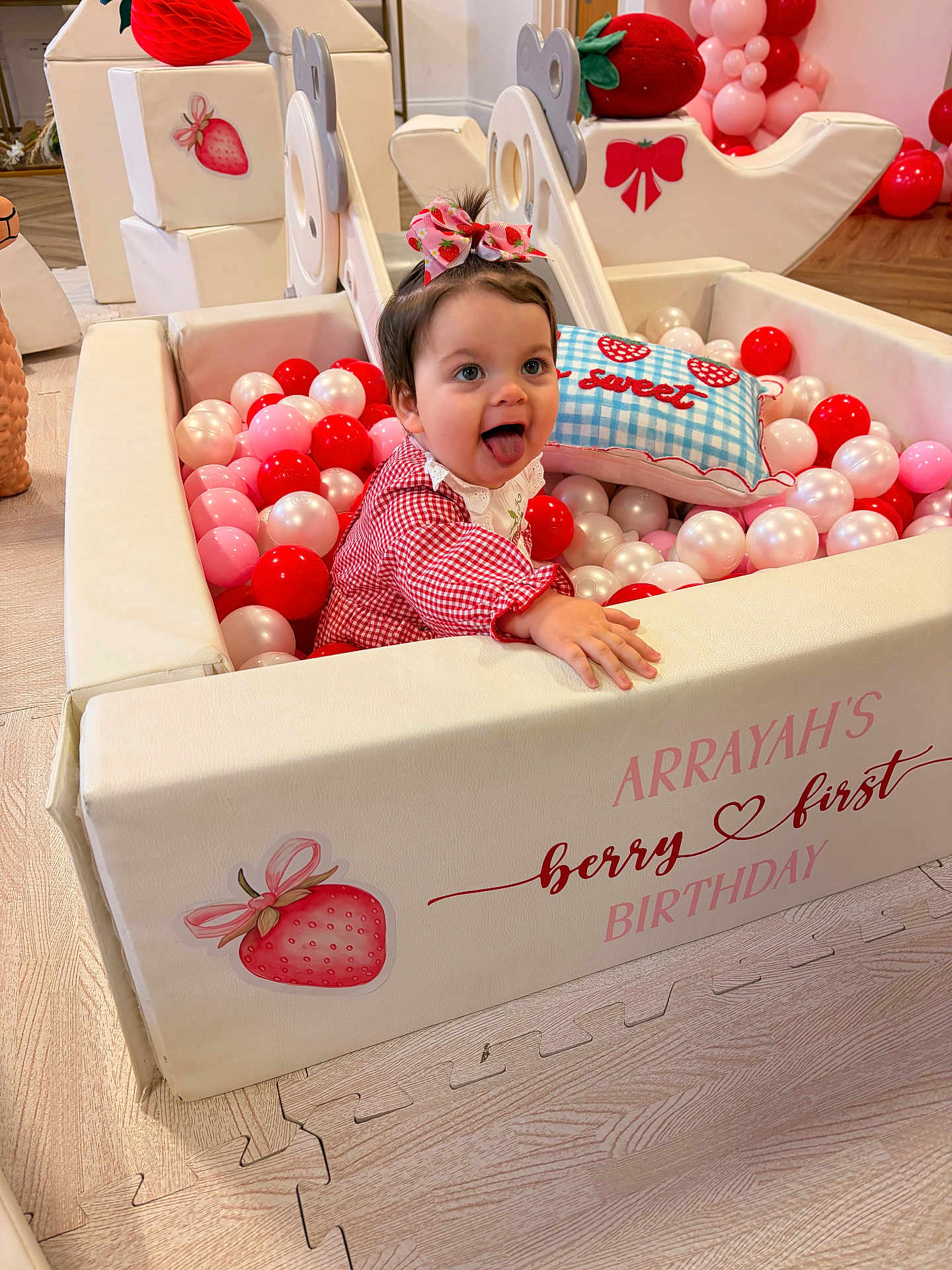 Arrayah joined the competition — help win amazing prizes! baby, ball_pit, balloons, birthday, bow, celebration, child, cute, decorations, dress, floor, indoor, party, pearls, pillow, pink, playful, red, strawberry, tongue_out