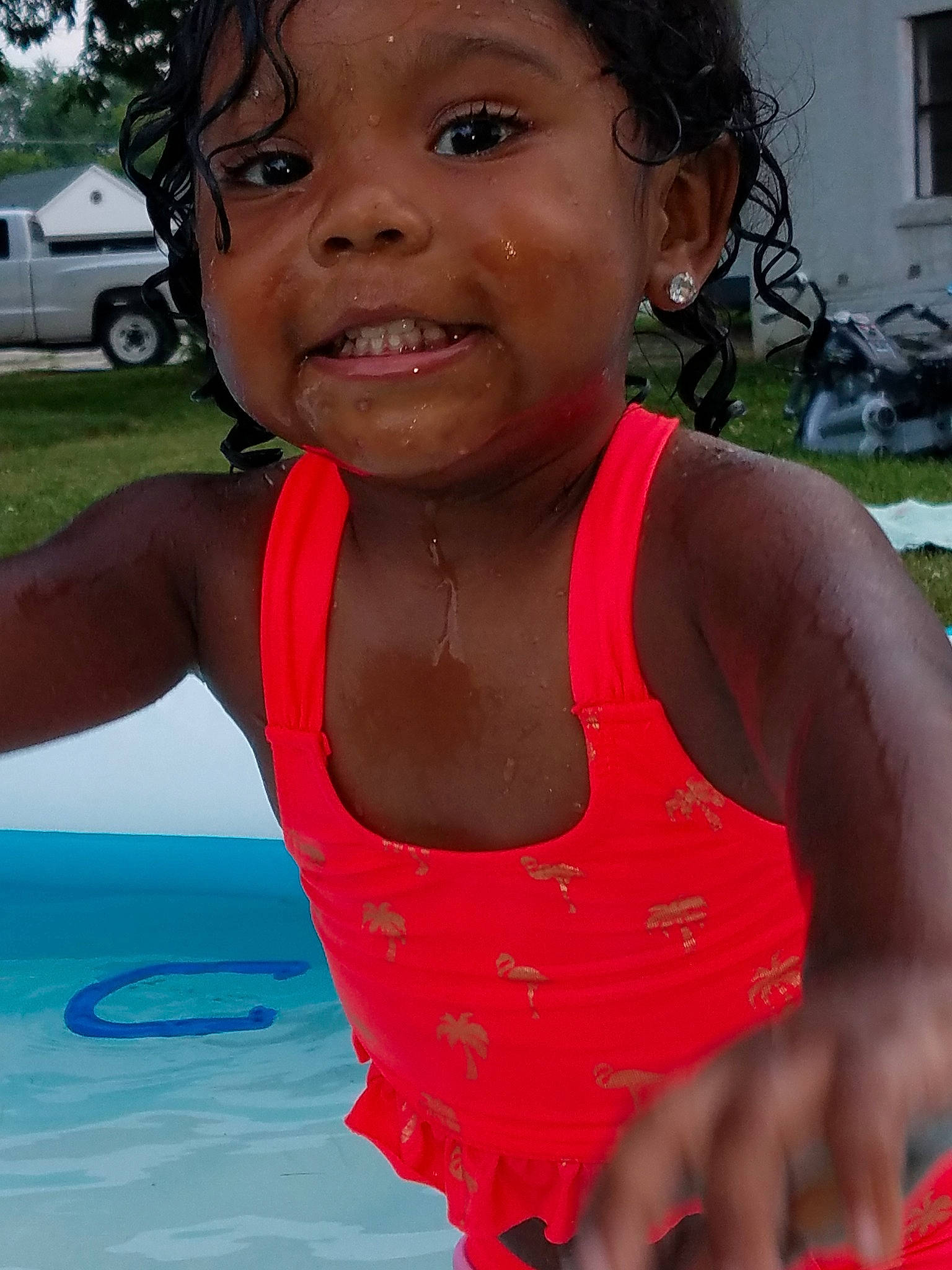 A'Madianna is registered to the contest to win money with this photo: abdomen, black_hair, cheek, child, cool, emotion, face, facial_expression, fun, girl, happiness, joy, leisure, mouth, neck, person, play, smile, summer, toddler