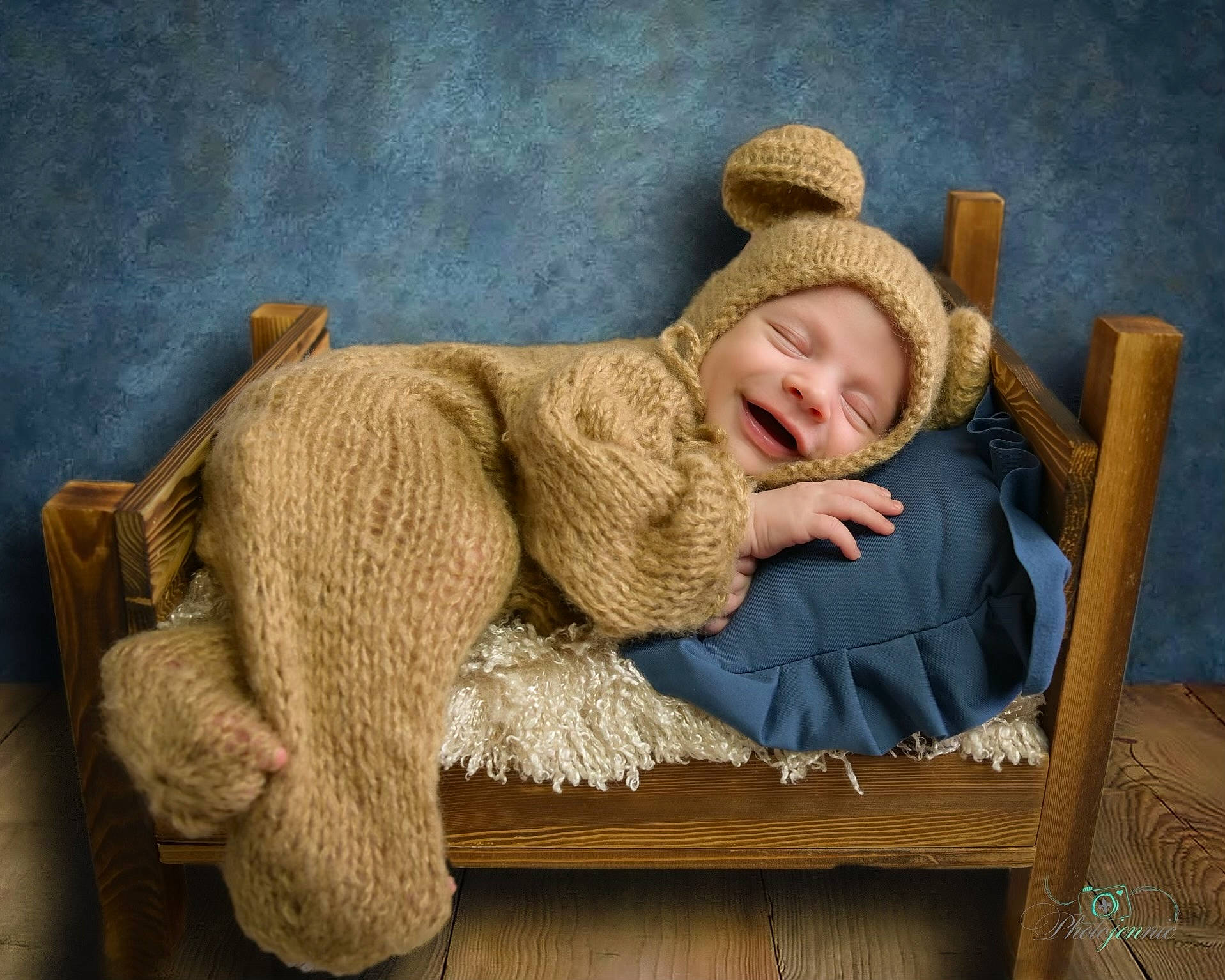 Tucker is registered to the contest to win money with this photo: art, child, comfort, costume_hat, fur, fur_clothing, hat, headgear, headwear, illustration, outerwear, painting, person, portrait_photography, sitting, sun_hat, toddler, vintage_clothing, visual_arts, wood