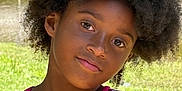 Araelynn Burkett is registered to the contest to win money with this photo: child, afro_hair, outdoor, pond, bridge, greenery, grass, sunlight, portrait, face, smile, tank_top, colorful_clothing, nature, daylight, young_person, casual, summer, happy, relaxing