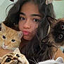 woman, cat, selfie, pets, cute, feline, animal, portrait, indoor, long_hair, brown_hair, orange_cat, white_cat, gray_cat, tabby_cat, siamese_cat, close_up, faces, looking_at_camera, fun