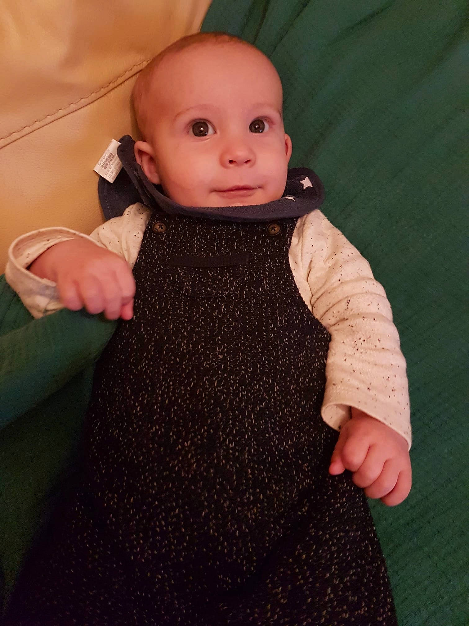 Pharrell a rejoint le concours — aidez-le/la à gagner de superbes lots ! baby, baby_toddler_clothing, cheek, day_dress, doll, eyelash, fashion_design, formal_wear, gesture, linens, neck, one_piece_garment, pattern, person, skin, sleeve, thumb, toy, wool, woolen