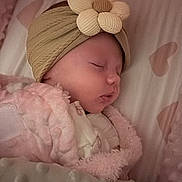 Isla-Rae is registered to the contest to win money with this photo: baby, blanket, child, closeup, cozy, cute, fabric, flower, headband, indoors, infant, nursery, peaceful, pink, portrait, rest, sleeping, soft, texture, warm
