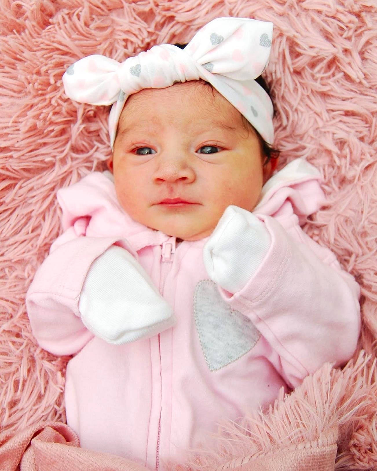 Analia is registered to the contest to win money with this photo: baby, baby_products, baby_toddler_clothing, bonnet, cheek, child, child_model, eye, face, fur, hair_accessory, happy, head, headgear, person, photography, pink, product, skin, textile