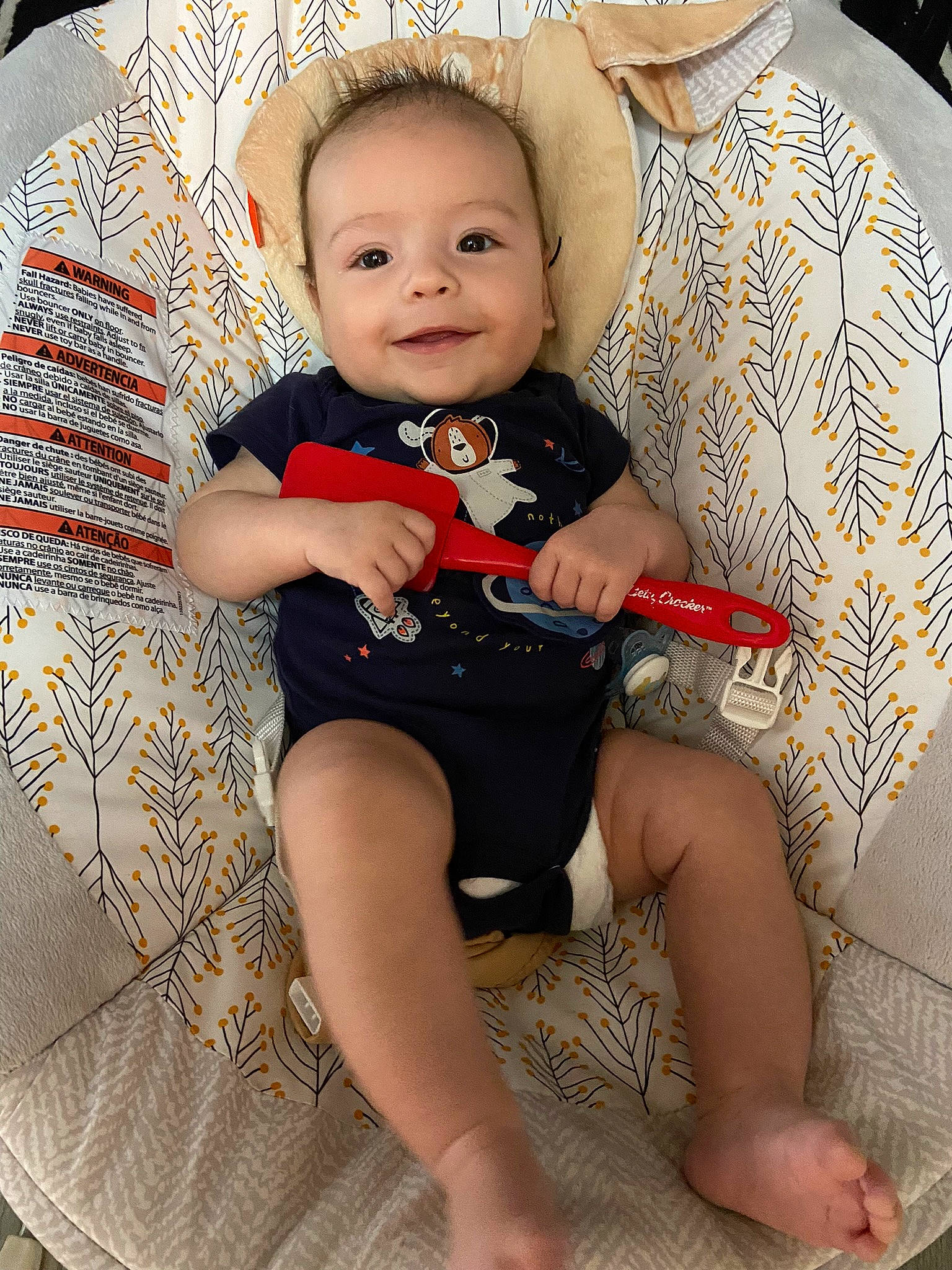 Jacob is registered to the contest to win money with this photo: baby, baby_toddler_clothing, chair, cheek, child, comfort, flash_photography, happy, head, human_body, human_leg, joy, knee, lap, leg, person, skin, sleeve, smile, sock