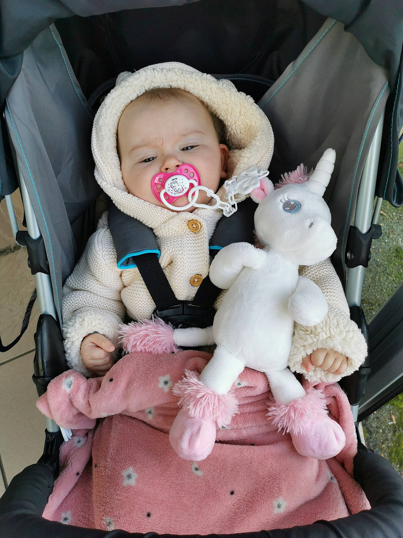 Elilya participe au concours pour gagner de l'argent avec cette photo : baby, baby_carriage, baby_products, baby_toys, car_seat, child, doll, fawn, person, pink, product, sitting, skin, smile, stuffed_toy, toddler, toy