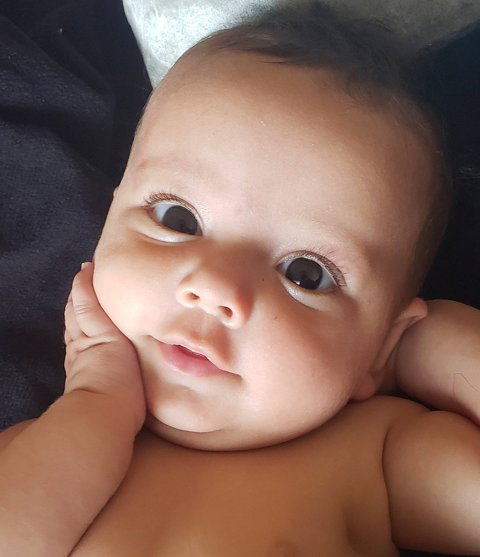 baby, bodypart, ear, face, finger, frown, hand, happy, head, mouth, newborn, person, photography, portrait, sad, skin, smile