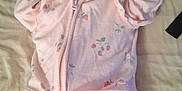 D'Nola joined the competition — help win amazing prizes! baby, bed, blanket, child, cute, fabric, indoor, infant, lying_down, mitten, newborn, onesie, peaceful, person, pink_clothing, quilt, sleepwear, sleepy, soft_lighting, strawberry_pattern