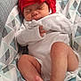 D'Nola is registered to the contest to win money with this photo: baby, baby_seat, blanket, child, closeup, comfort, cute, feet, hand, headband, indoor, infant, legs, newborn, onesie, pattern, red_bow, rest, skin, sleeping