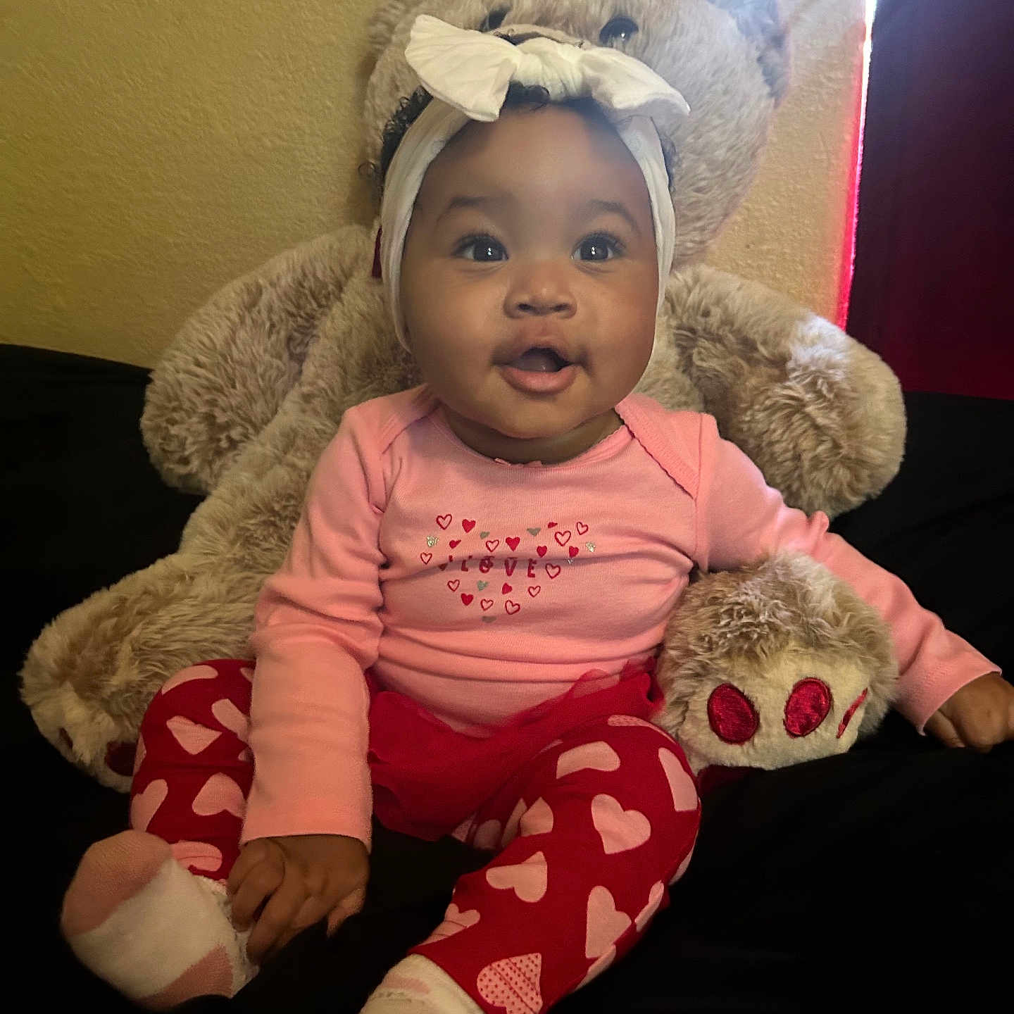 Kelena is registered to the contest to win money with this photo: baby, bodypart, clothing, costume, couch, cushion, face, finger, furniture, hand, hat, head, homedecor, hosiery, person, photography, portrait, sitting, sock, toy