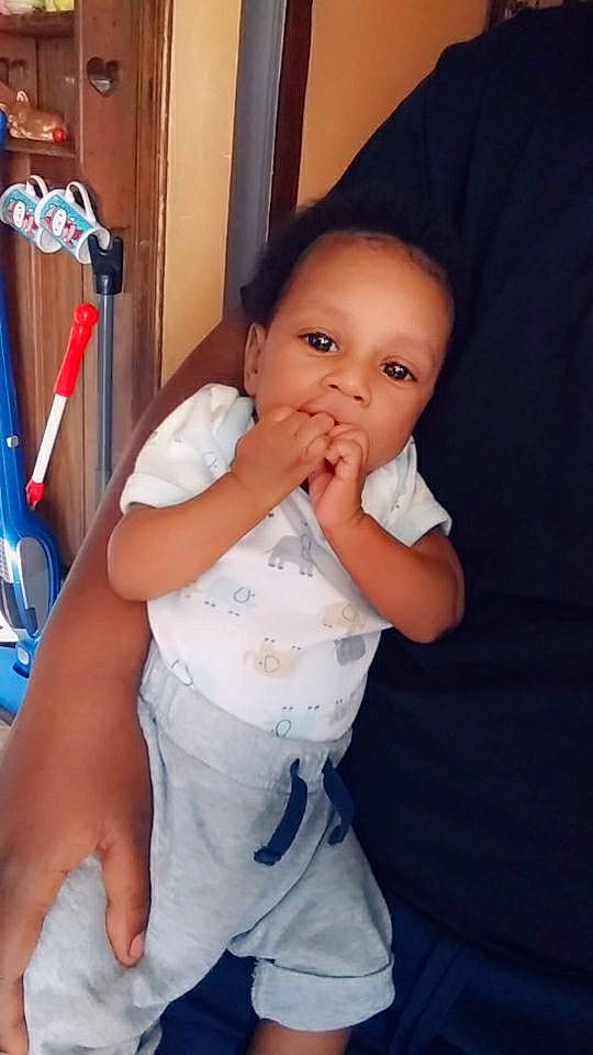 Sincere is registered to the contest to win money with this photo: baby, cheek, child, eye, finger, lip, nose, person, skin, smile, thumb, toddler