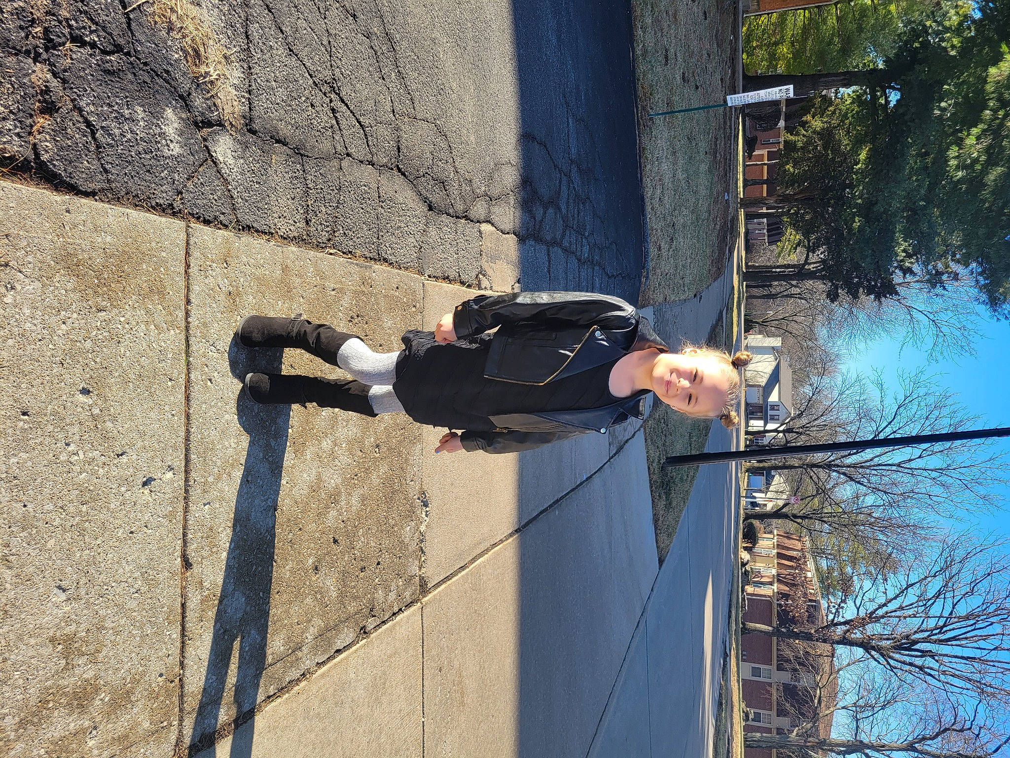 Bailee is registered to the contest to win money with this photo: adventure, composite_material, concrete, elbow, electric_blue, electrical_supply, electricity, facade, joy, leisure, outdoor_shoe, person, plant, public_utility, recreation, rope, shadow, sky, tree, walking_shoe