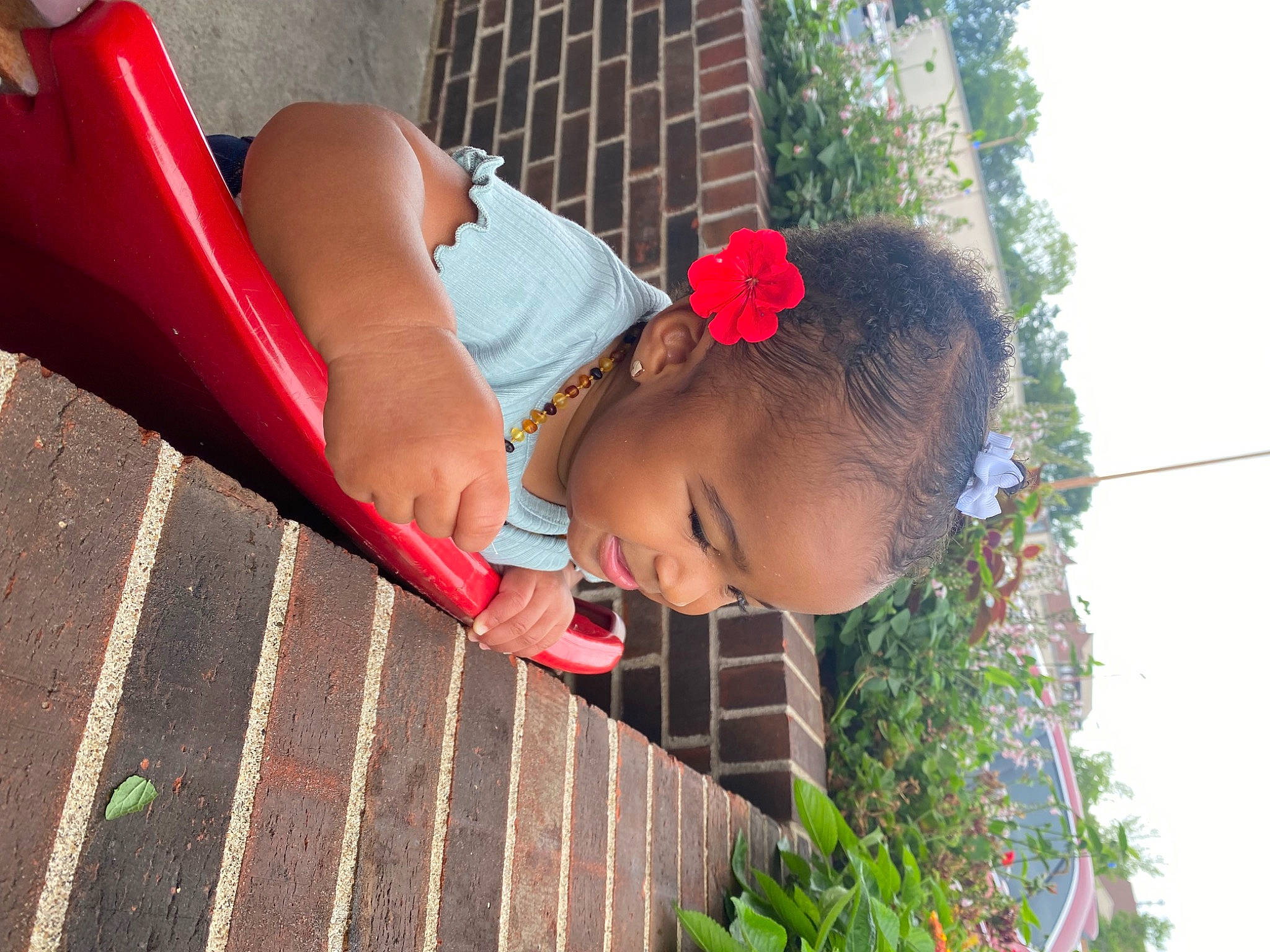 Leiana is registered to the contest to win money with this photo: baby, baby_toddler_clothing, dress, flower, fun, glasses, grass, happy, hat, leisure, lip, magenta, person, pink, plant, red, summer, sunglasses, toddler, tree