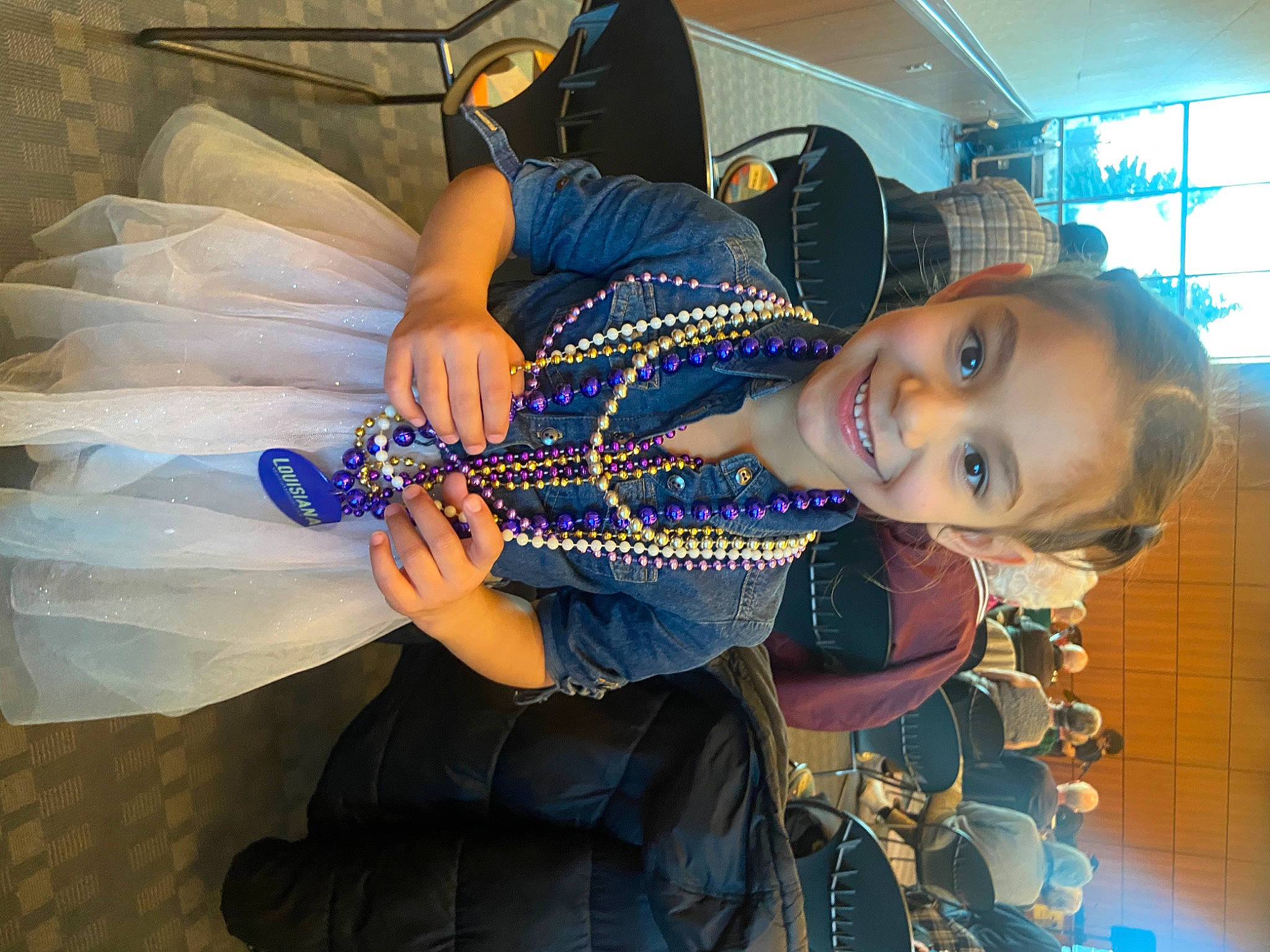 Araceli is registered to the contest to win money with this photo: black_hair, child, cool, electric_blue, eyewear, fashion, fashion_accessory, fashion_design, fun, happy, hat, human_leg, jewellery, joy, mouth, necklace, pattern, person, smile, thigh