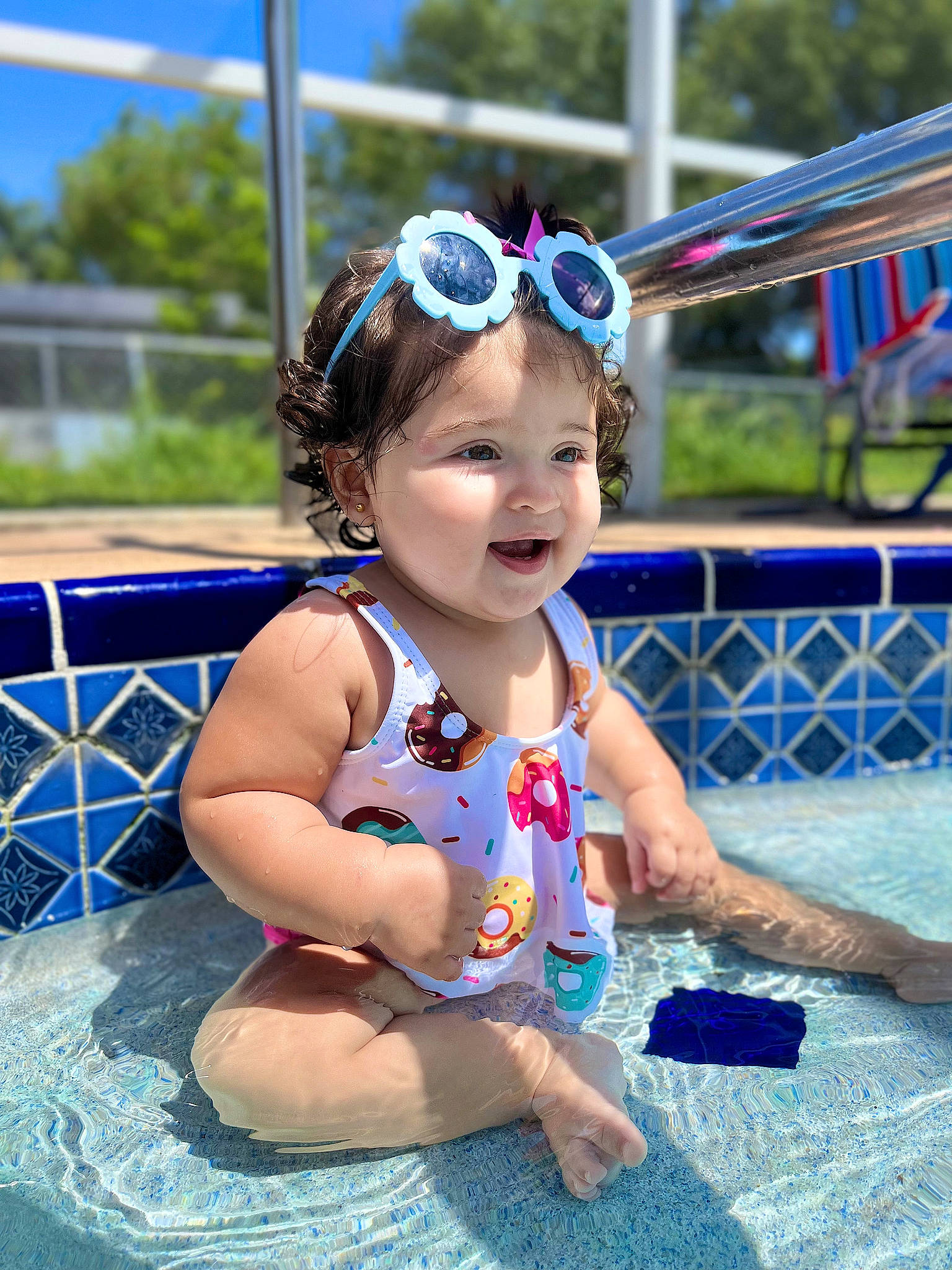 Alaia joined the competition — help win amazing prizes! baby_toddler_clothing, bathing, blue, child, electric_blue, eyewear, fun, goggles, grass, happy, leisure, outdoor_recreation, person, personal_protective_equipment, recreation, smile, summer, swimming_pool, swimwear, toddler