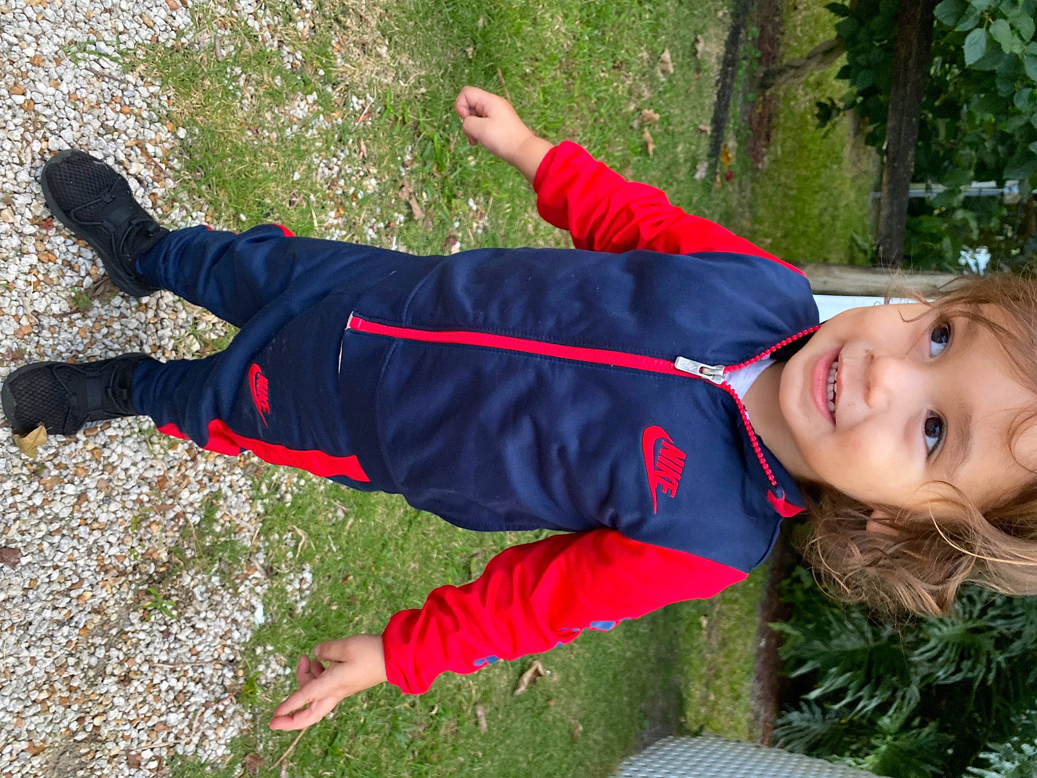 Jahsiah is registered to the contest to win money with this photo: carmine, electric_blue, fun, grass, happy, hat, holiday, joy, leisure, people_in_nature, person, plant, recreation, sleeve, smile, sock, sweatpant, t_shirt, toddler, tree