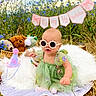 Elena joined the competition — help win amazing prizes! baby, child, sunglasses, green_dress, plush_toys, party_hat, outdoor, wildflowers, grass, blanket, celebration, half_birthday, cute, sitting, pink, footwear, nature, sunny, portrait, fun