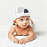 Vedh is registered to the contest to win money with this photo: baby, baseballcap, bathingcap, beanie, bodypart, bonnet, cap, clothing, crawling, face, finger, hand, hat, head, newborn, person, photography, portrait, sunhat, swimwear